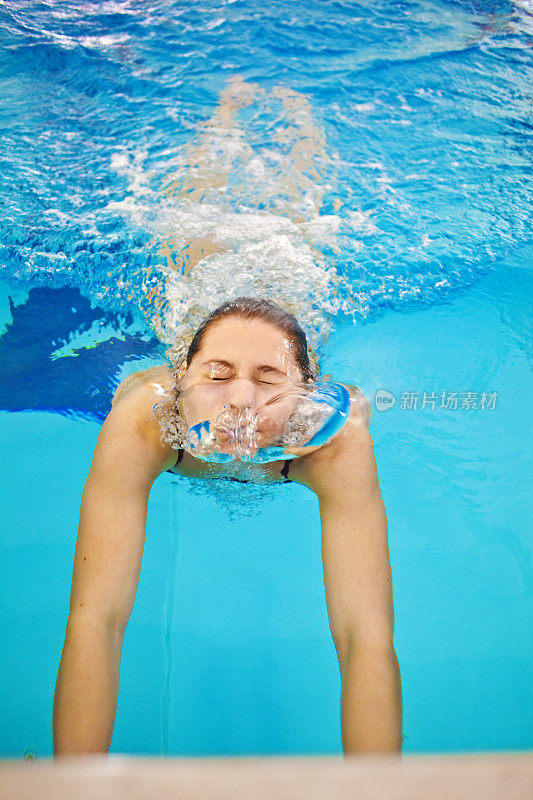 Young female swimmer